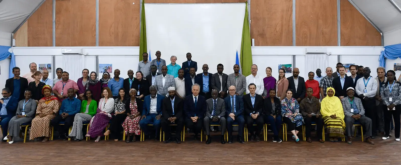 Group photo of people at the Air Force Hangar, Mogadishu